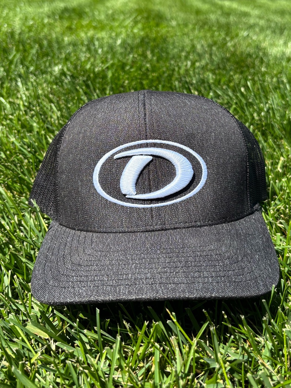 Black Mesh Snapback Cap with Light Blue Oval Logo